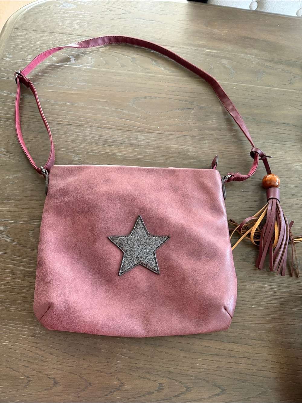 Dusty Rose Star Accent Crossbody with Tassel Charm